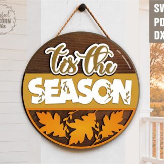 'Tis the Season round autumn door hanger SVG with layered lettering and fall leaves for laser cutting