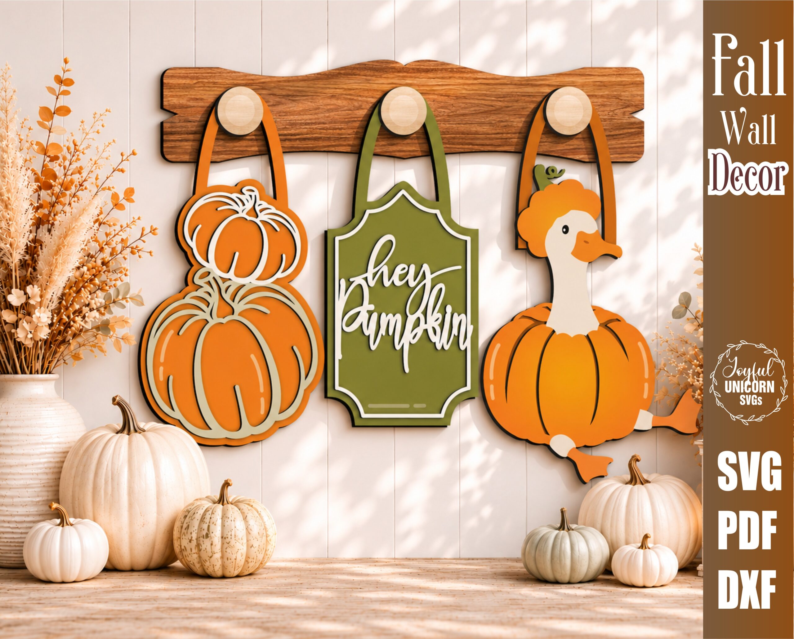 Interchangeable fall wall decor SVG featuring stacked pumpkins, a Hey Pumpkin sign, and a pumpkin goose hanging from wooden hooks on a decorative wooden display bar, laser cut file for Glowforge, CNC machines, and other lasers