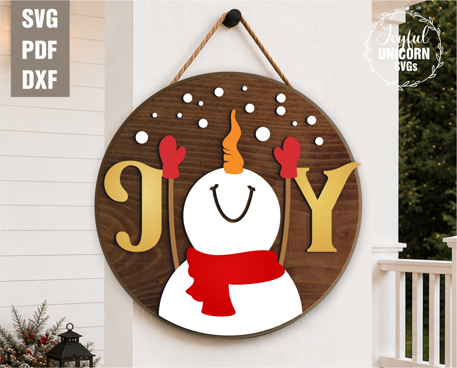 Christmas snowman JOY door hanger SVG featuring a smiling snowman with a red scarf, mittens, and falling snowflakes on a round wooden sign, laser cut file for Glowforge, CNC machines, and other lasers.